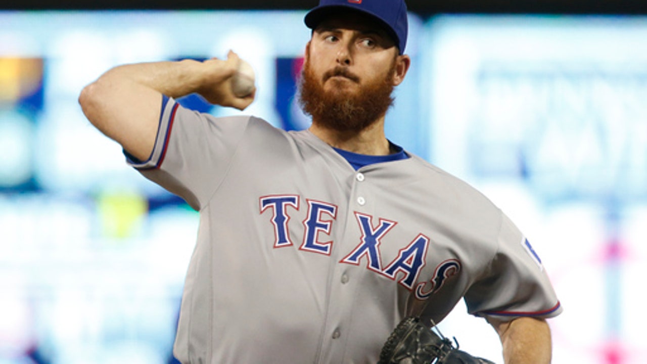 Rangers trade struggling reliever Sam Dyson to Giants